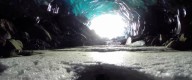 Ледник и ледяные пещеры под крылом беспилотника