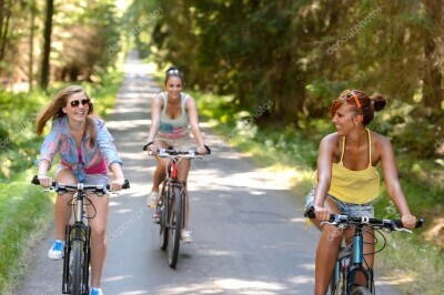 depositphotos_42390705-stock-photo-happy-girls-riding-bicycles-outside.jpg